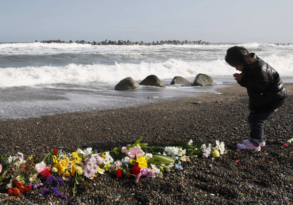 Japan took silent for a minute to remember quake and tsunami victims